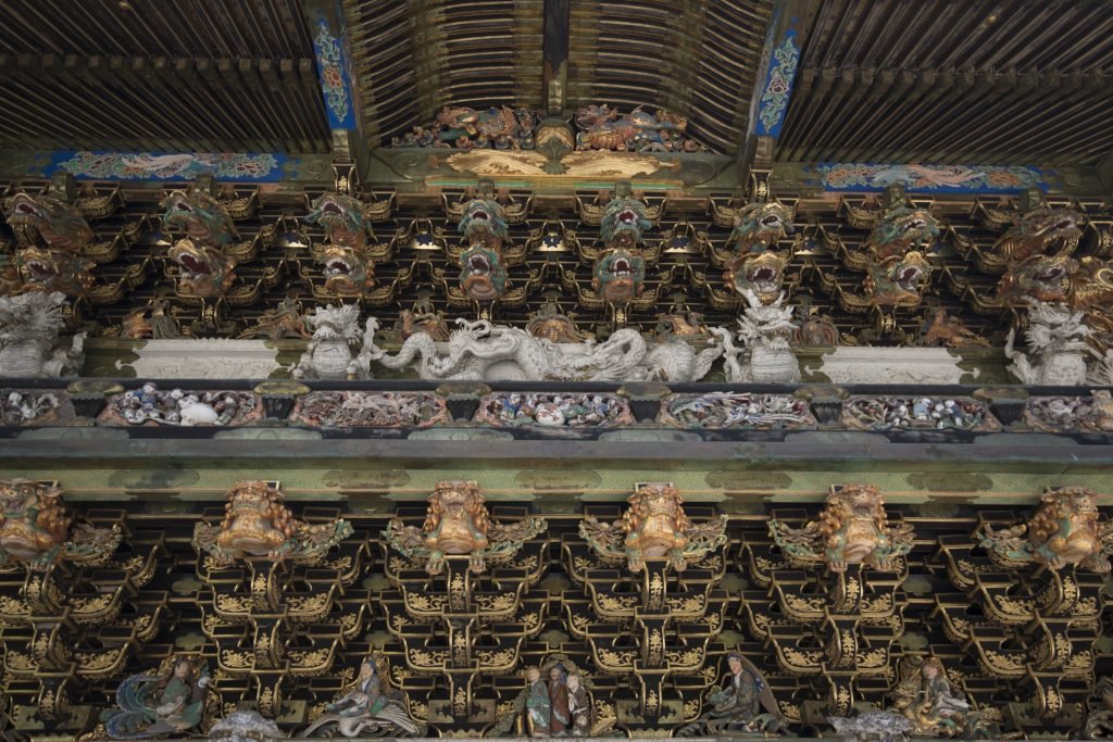 Nikko Tosho-gu shrine gate among cedar forest