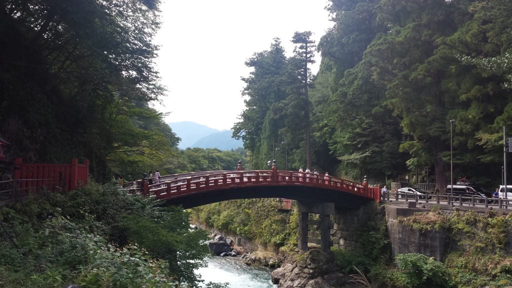 The vermilion Shinkyo Bridge over the Daiya River at Nikko